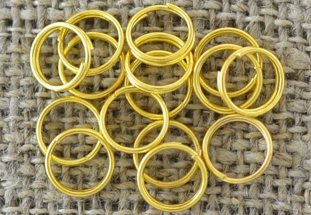 201002 Ogniwka sprężynki okrągłe 7mm w kolorze złotym 100szt