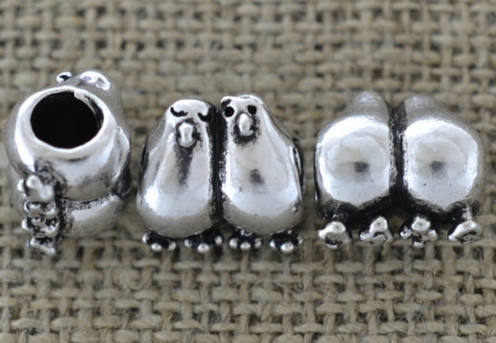 {312175} Koralik modułowy pingwiny w kolorze srebrnym