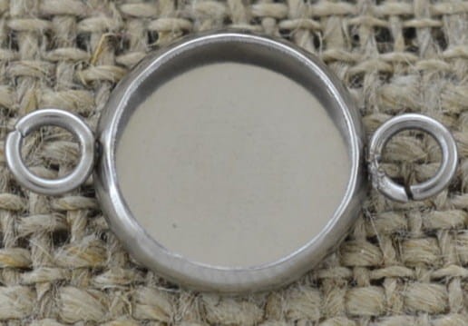 [301106] Klasyczna baza medalionu łącznik w kolorze srebrnym na kaboszon 10mm