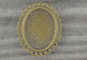 10211 Ozdobna baza broszki w kolorze brązu na kaboszon 25*18mm