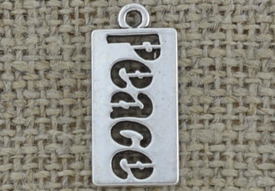 Zawieszka mała "Peace" kolor srebra 2szt