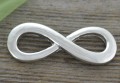 31262 Element ozdobny łącznik znak nieskończoności w kolorze srebra.jpg