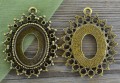  10161 Ozdobna baza medalionu w kolorze brązu na kaboszon 26*20mm