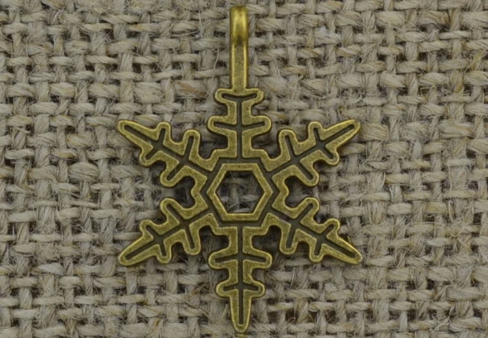 [ś07433] Zawieszka metalowa mała płatek śniegu 24*17mm w kolorze brązu