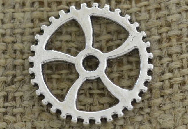 [312219] Element ozdobny steampunk tryb w kolorze srebrnym 18mm
