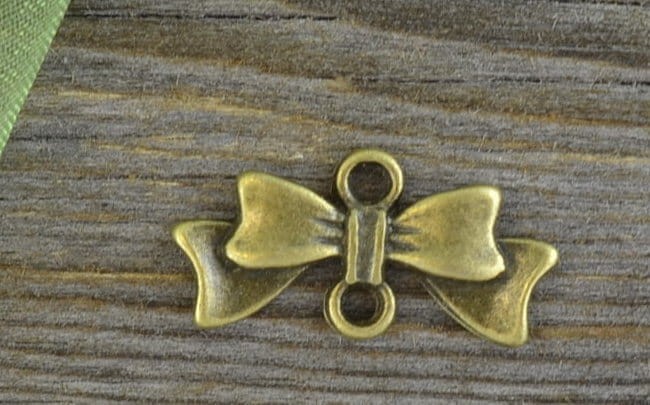 11279 Element ozdobny łącznik kokardka w kolorze brązu 3szt