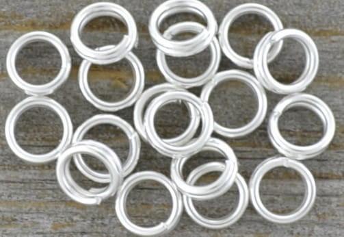 301007 Ogniwka sprężynki okrągłe 4mm w kolorze srebra 200szt