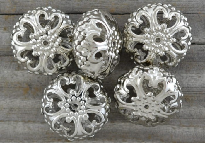 312103 Koralik ozdobny w kolorze srebra 23*13mm