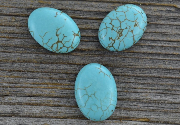 046128 Turkus kaboszon owalny 18*13mm