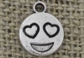 [307405] Zawieszka mała emotikon w kolorze srebrnym