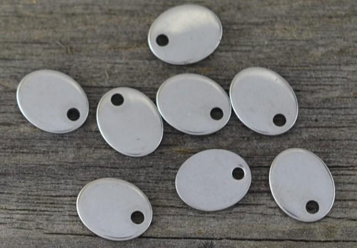 {307112} Zawieszka ze stali nierdzewnej owalna