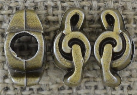 11299 Koralik modułowy klucz wiolinowy w kolorze brązu