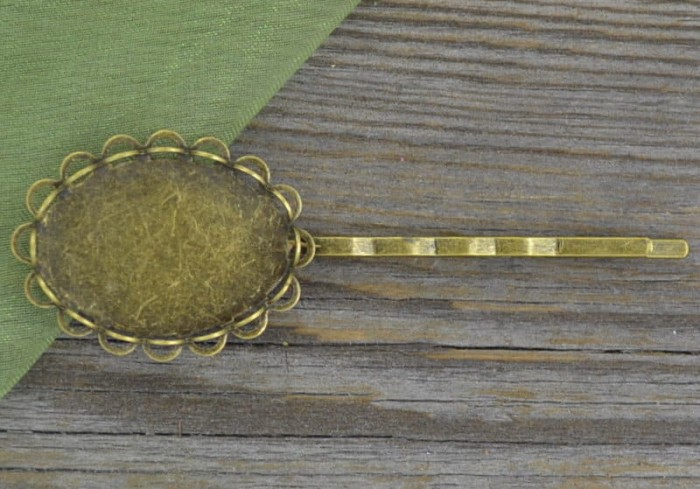 10522 Ozdobna baza wsuwki w kolorze brązu na kaboszon 25*18mm