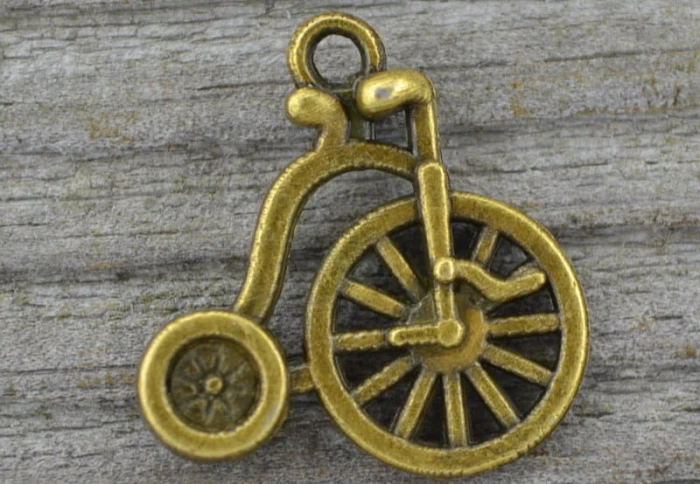 107256 Zawieszka mała bicykl w kolorze brązu 3szt