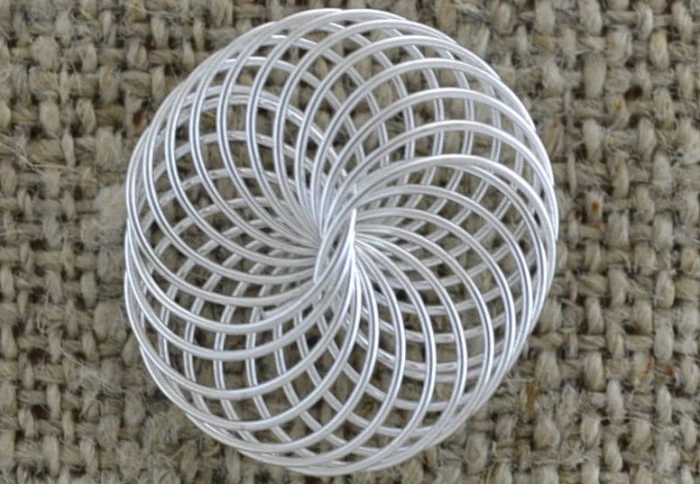 312136 Element ozdobny w kolorze srebra