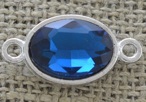 [312181] Element ozdobny łącznik cyrkonią w kolorze niebieskim