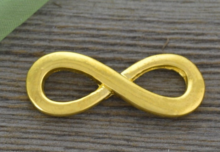 21214 Element ozdobny znak nieskończoności w kolorze złota