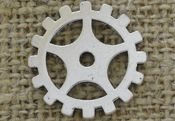 [312223] Element ozdobny steampunk tryb w kolorze srebrnym 19mm