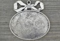 30148 Ozdobna baza medalionu w kolorze srebra na kaboszon 35*45mm