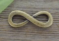11260 Element ozdobny łącznik znak nieskończoności w kolorze brązu