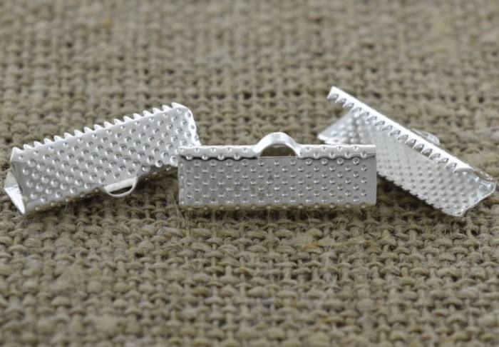 57191 Końcówka wstążki w kolorze srebra 20*7mm 10szt