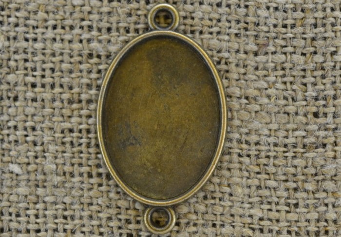 101168 Klasyczna baza łącznik w kolorze brązu na kaboszon 25*18mm