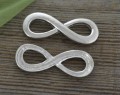 31262 Element ozdobny łącznik znak nieskończoności w kolorze srebra.jpg