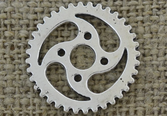 [312203] Element ozdobny steampunk tryb w kolorze srebrnym 23mm