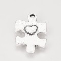 [30767] Zawieszka mała puzzel z serduszkiem w kolorze srebra