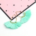 [207212] Zawieszka w kolorze złotym łezka z miętowymi frędzlami