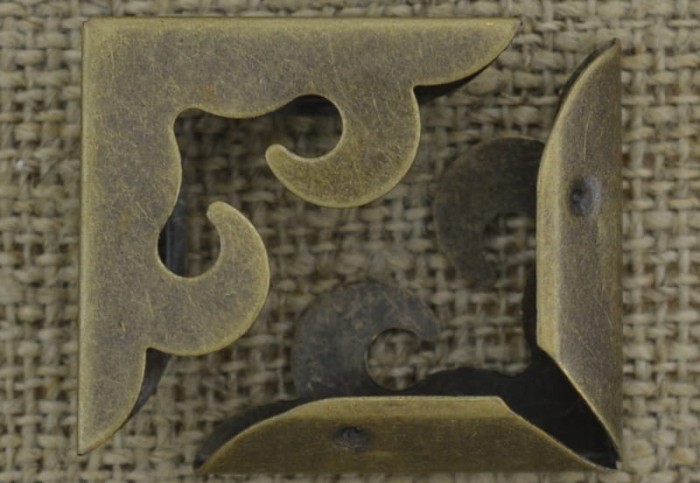  [k0525] Narożnik do książki brąz 27*27mm