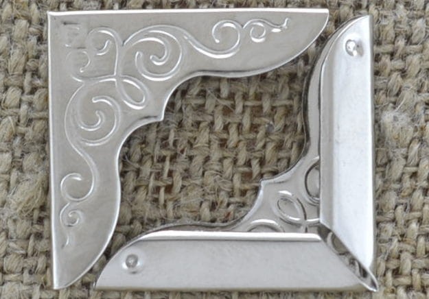 k0504 Narożnik ozdobny w kolorze srebrnym 23*23mm 4szt