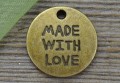 107232 Zawieszka mała moneta Made with love w kolorze brązu