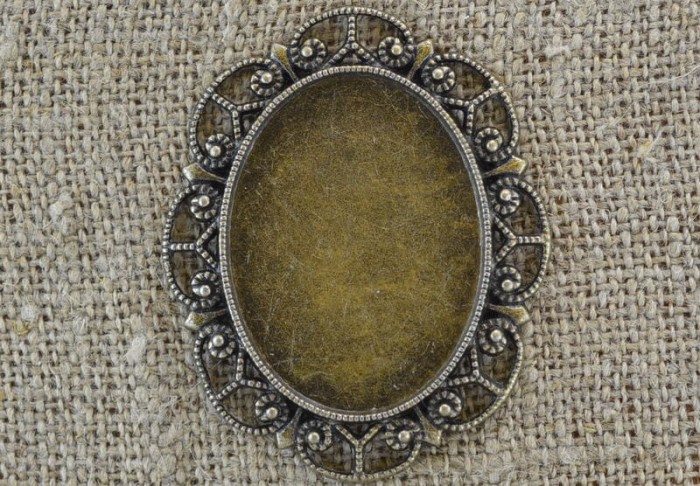 101156 Ozdobna baza w kolorze brązu na kaboszon 40*30mm