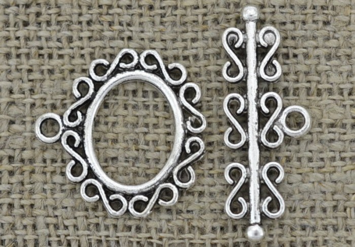  {31511} Zapięcie ozdobne przekładane w kolorze srebrnym