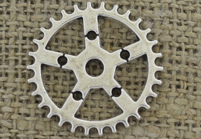 [312189] Element ozdobny tryb w kolorze srebrnym 30mm