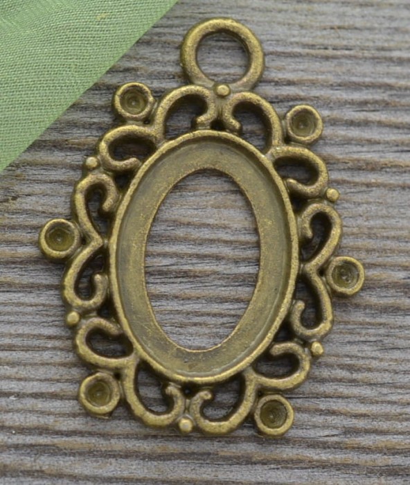101124 Ozdobna baza medalionu w kolorze brązu na kaboszon 18x13mm