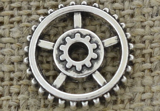 [312222] Element ozdobny steampunk tryb w kolorze srebrnym 18mm