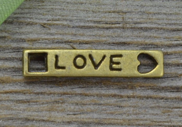 11266 Element ozdobny łącznik blaszka z napisem love w kolorze brązu 