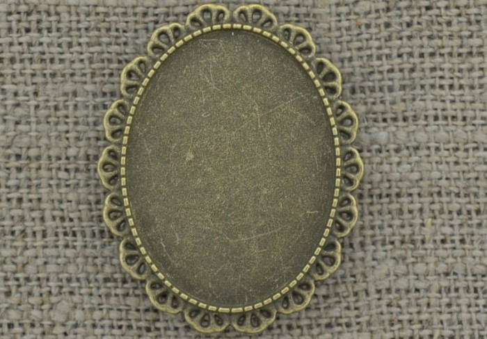 10234 Ozdobna baza broszki w kolorze brązu na kaboszon 40*30mm