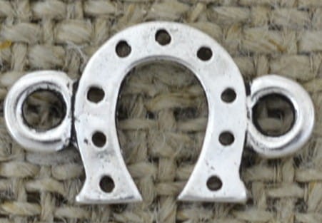 {312177} Element ozdobny łącznik podkowa w kolorze srebrnym