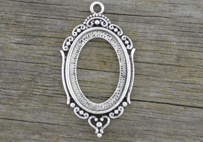 50127 Ozdobna baza medalionu w kolorze starego srebra na kaboszon 24*18mm
