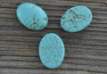 046128 Turkus kaboszon owalny 18*13mm