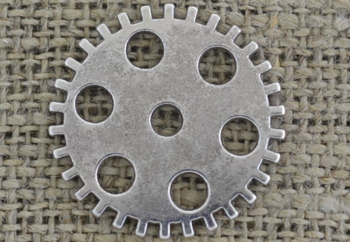 [312187] Element ozdobny tryb w kolorze srebrnym 25mm 