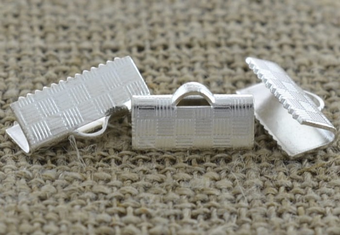 57190 Końcówka wstążki w kolorze srebra 15*6mm 3szt