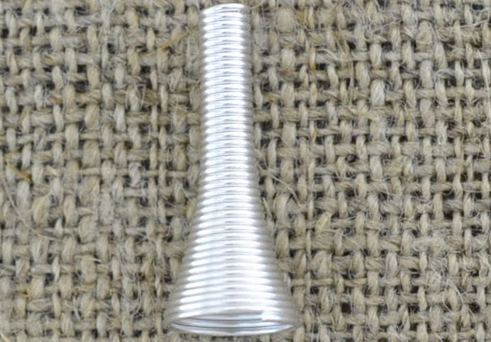 312131 Nakładka na koralik sprężynka w kolorze srebrnym 25mm