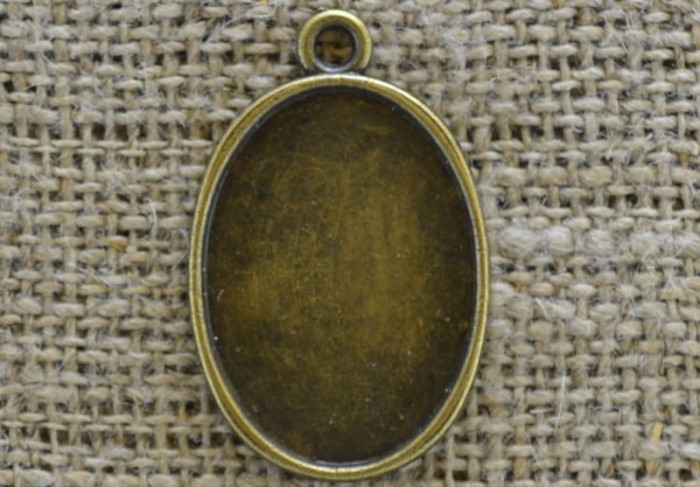 101172 Klasyczna baza medalionu w kolorze brązu na kaboszon 25*18mm