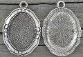  30152 Ozdobna baza medalionu w kolorze srebra na kaboszon 18*25mm