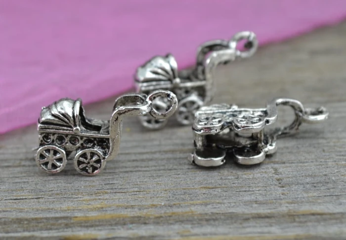 307198 Zawieszka mała wózek w kolorze srebrnym