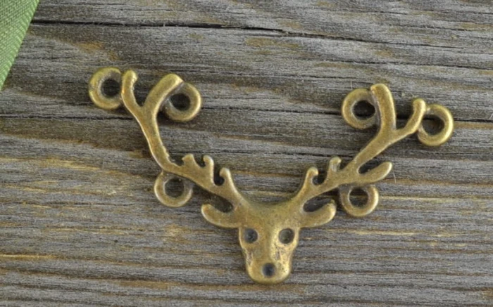 10766 Element ozdobny łącznik renifer w kolorze brązu